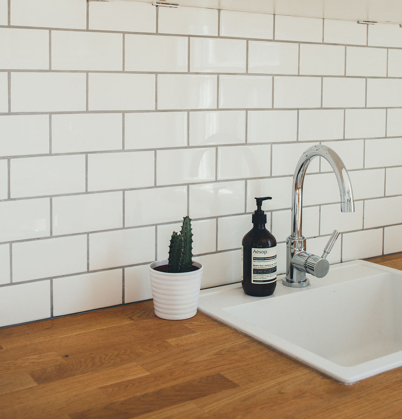 Image of faucet with wall tiles